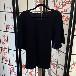 Gently used navy bluer Ann Taylor dress shirt.